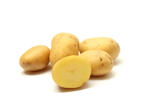 Potatis på vit bakgrund Stockbild