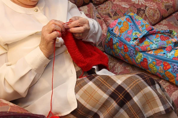 Grandmother's hands knitting — Stock Photo, Image