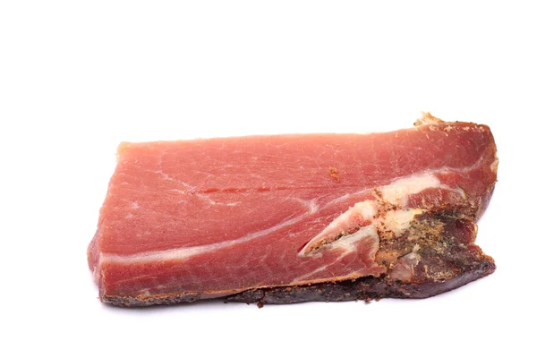 Scheibe Speck isoliert auf weiß — Stockfoto