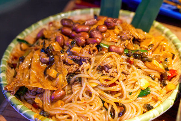 A delicious Chinese Guangxi special dish, fried snail noodles
