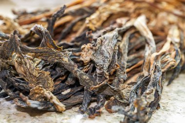 Masanın üzerinde bir avuç kurutulmuş sebze, Guangdong spesiyali kurutulmuş lahana.