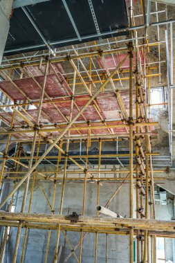 Scaffolding on a renovation site in a commercial storefront office