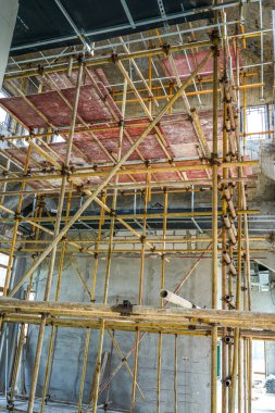 Scaffolding on a renovation site in a commercial storefront office