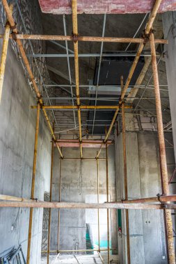 Scaffolding on a renovation site in a commercial storefront office