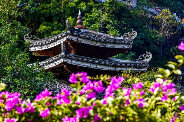 The ancient architecture of the Chinese-style garden Qiaojiaolou in the mountains and forests