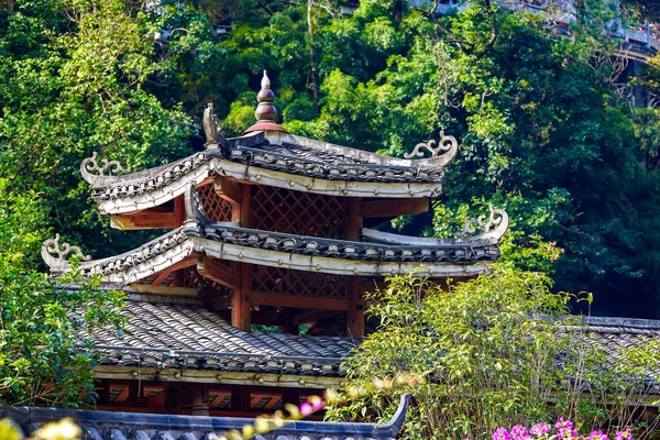 The ancient architecture of the Chinese-style garden Qiaojiaolou in the mountains and forests