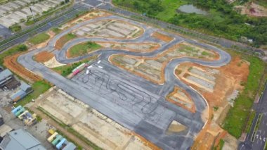 Aerial shot of a dedicated car track at a racetrack in the city