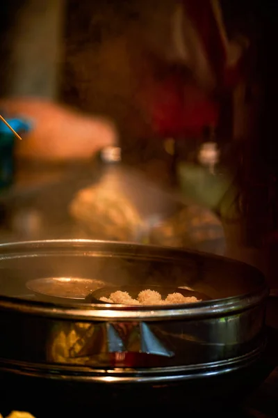 Cantonese morning tea dim sum is being cooked in a steamer in a Chinese kitchen