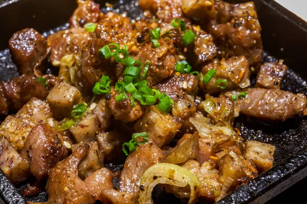 A delicious Japanese dish with sizzling beef and beef