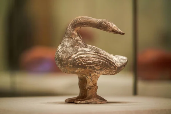 Ancient Chinese cultural relics from the Han Dynasty in the museum, clay goose statue