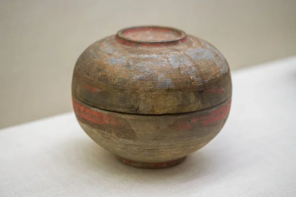 Ancient Chinese cultural relics from the Han Dynasty in the museum, kitchenware containers