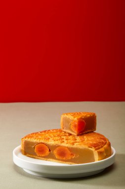 Cantonese-style traditional egg yolk lotus paste mooncake for Chinese Mid-Autumn Festival, translation: egg yolk lotus paste.