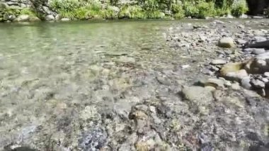 Crystal clear stream in the mountains in Guilin, Guangxi, China