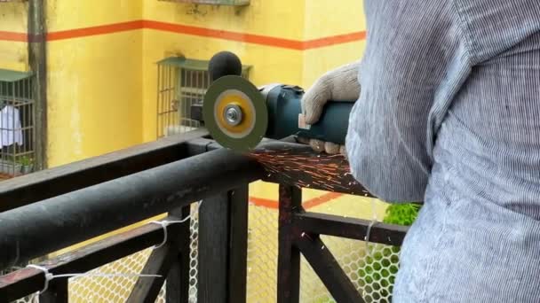 Worker Using Cutting Machine Cut Iron Guardrail Escalate Slow Motion — Vídeos de Stock