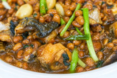 A delicious Chinese dish, braised bullfrog with soybeans