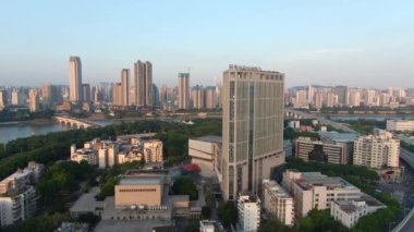 Aerial photography of Yongjiang Bridge and bustling buildings along the coast in Nanning, Guangxi, China