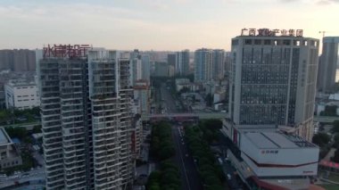 Close-up aerial photography of busy traffic roads and high-rise buildings in the city