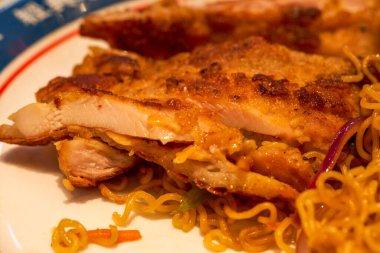 A delicious Hong Kong-style tea restaurant dish, Fried Chicken Chop Chow Mein