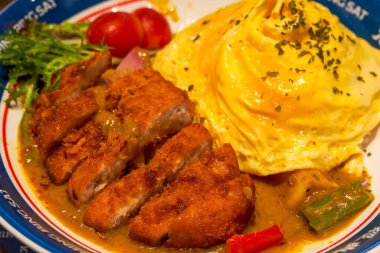 A delicious Hong Kong-style tea restaurant dish, curry pork chop omelette