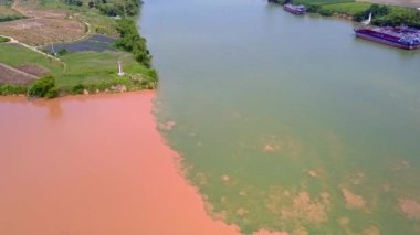 The unique landscape of Sanjiangkou in Nanning, Guangxi, China, where two rivers and two colors meet