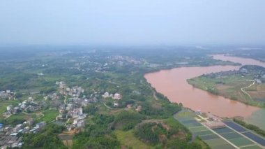 The unique landscape of Sanjiangkou in Nanning, Guangxi, China, where two rivers and two colors meet