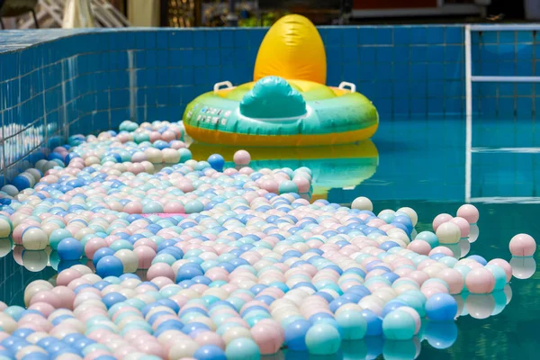 Pile of ocean balls in swimming pool closeup