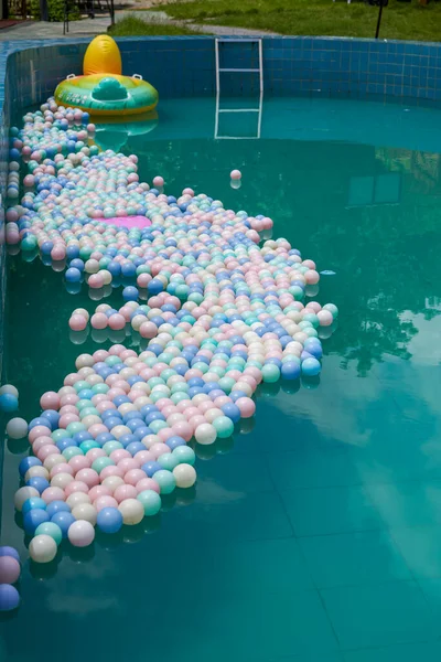 Pile of ocean balls in swimming pool closeup