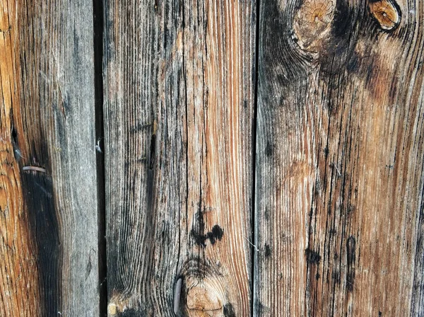 Old textured wooden brown-gray boards close-up background. — Stock Photo, Image