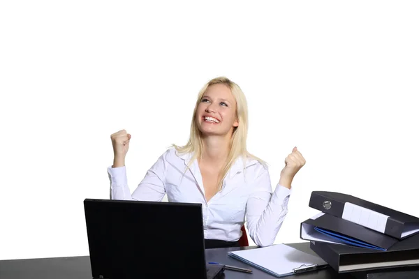 Beautiful young businesswoman in her office triumphant — Stock Photo, Image