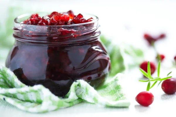 Cranberry sauce in glass jar — Stock Photo, Image
