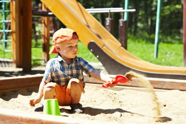 Child on playground clipart