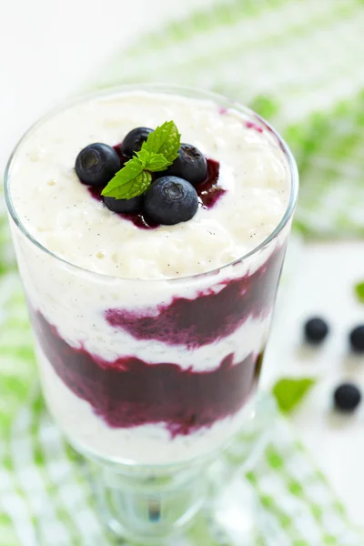 Rice pudding with blueberry — Stock Photo, Image