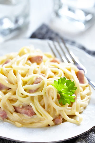 Pasta Carbonara with ham and cheese — Stock Photo, Image