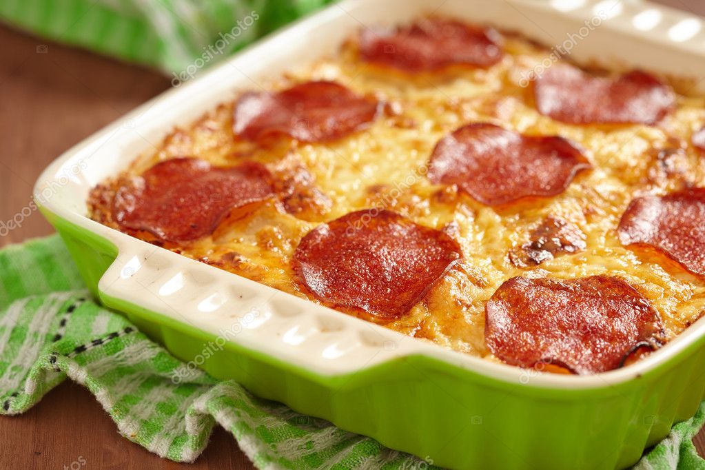 Casserole with pepperoni — Stock Photo © Odelinde 31044469