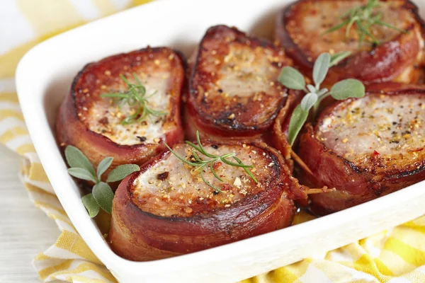 Roasted pork steak wrapped in bacon — Stock Photo, Image