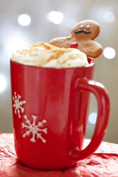 Gingerbread man in hot chocolate — Stock Photo, Image