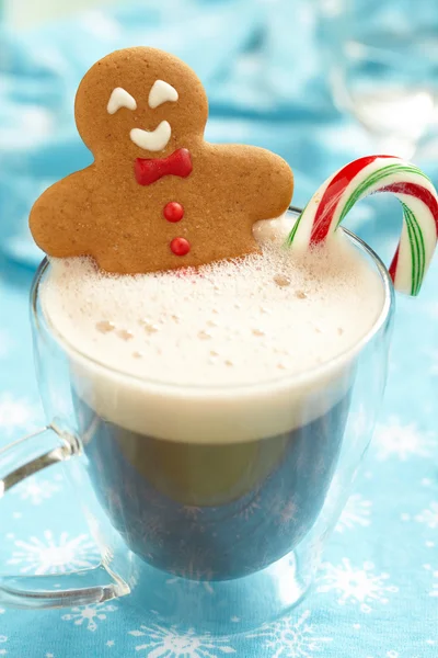 Gingerbread man in hot chocolate — Stock Photo, Image