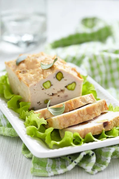 Chicken terrine with pistachios — Stock Photo, Image