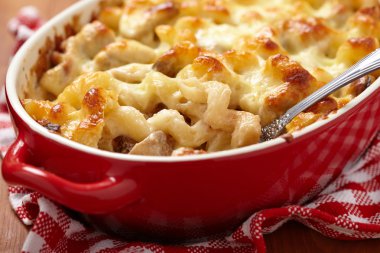 Macaroni with cheese, chicken and mushrooms clipart