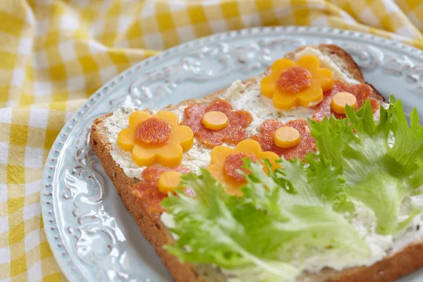 Sandwich for child with flowers — Stock Photo, Image
