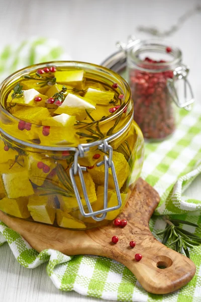 Marinated cheese in olive oil — Stock Image Marinated cheese in olive oil Royalty Free Stock Images