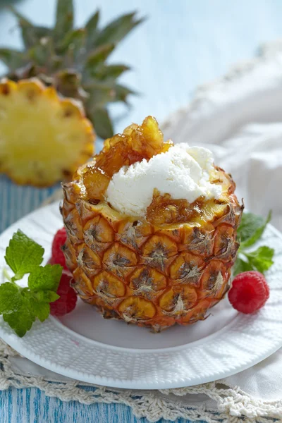 Fruit sorbet ice cream in small pineapple — Stock Photo, Image