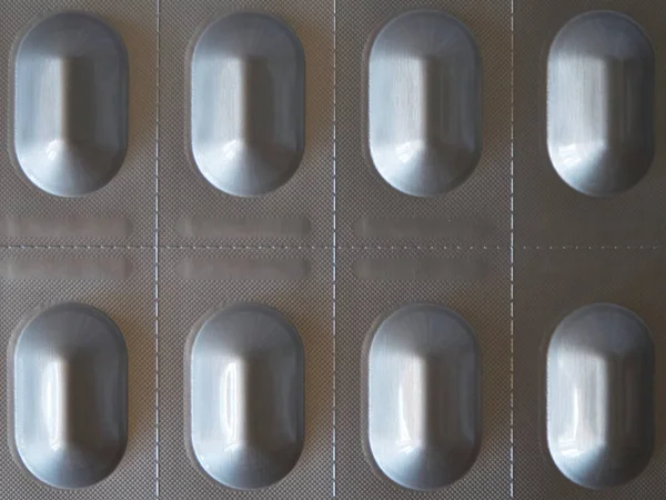 Ein Silbernes Päckchen Mit Pillen Eine Nahaufnahme — Stockfoto