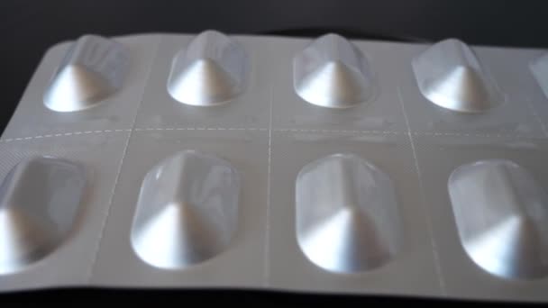 Opakowanie Pigułkami Czarnej Powierzchni Zbliżenie Tabletki Makro — Wideo stockowe