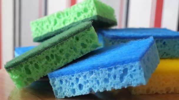 Multi Colored Washcloths Washing Dishes Cleaning Rotating Surface Macro Video — Stockvideo