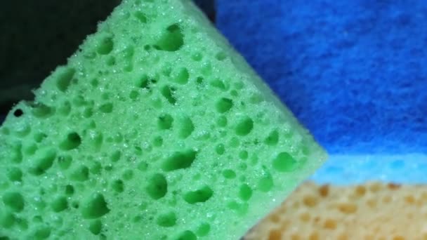 Yellow Green Blue Sponges Washing Dishes Highly Detailed Video Multicolored — Stockvideo