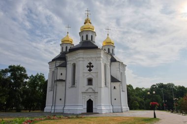Cloudy sky over the ancient Church of St. Catherine in the Ukrainian city of Chernihiv. An example of baroque architecture. Church is distinguished by its five gold domes.