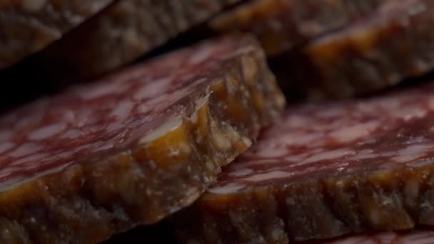 Pieces Smoked Salami Macro Video Sausage Full Frame Sliding Shot — Vídeo de Stock