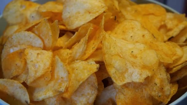 Full Bowl Potato Chips Close Macro Video — стоковое видео