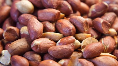 Yakın plan kavrulmuş kabuksuz fıstık. Fıstık arkaplanına yakın plan